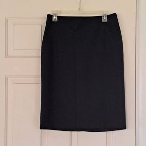 Doc & Amelia black midi lined business skirt. Size 6R.
